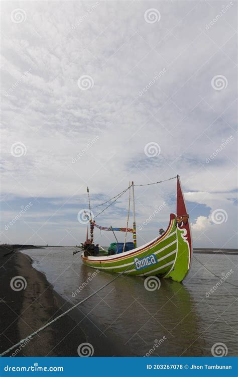 Traditional Fishing Boat On Pecinan Beach Editorial Stock Photo