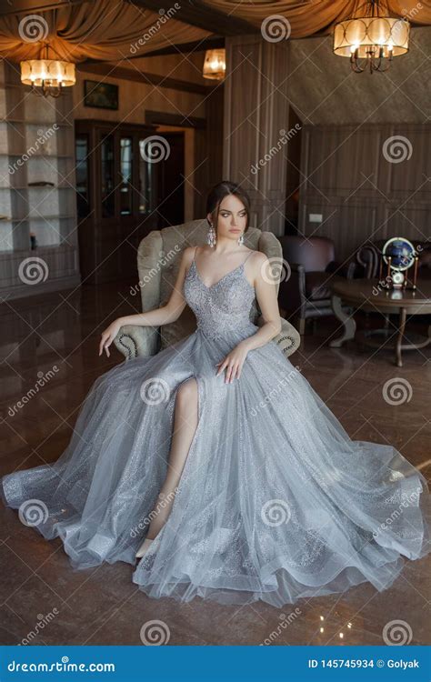 Young Woman In Elegant Evening Dress Studio Shot Stock Photo Image