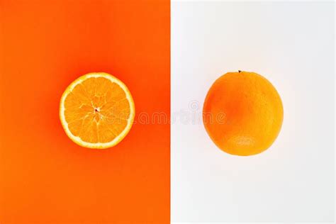 One Whole And One Halved Slice Of Orange Comparison Stock Image Image
