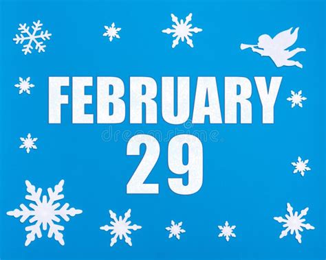 February 29th Winter Blue Background With Snowflakes Angel And A