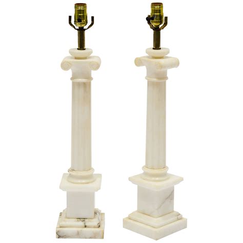 Made of natural, raw height of alabaster varies from 9t to 12t; Pair of Italian Alabaster Column Lamps at 1stdibs