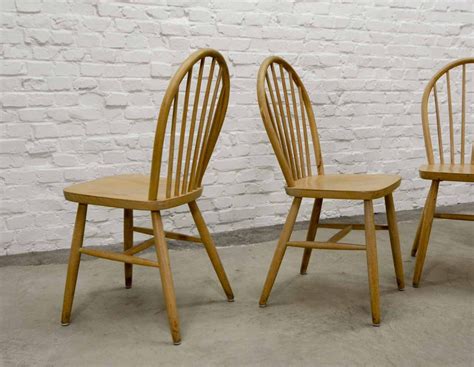 Set Of Four Scandinavian Beech Wood Spindle Back Dining Chairs In Style