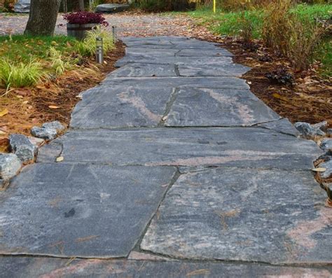 Cobblestone driveways are the attractive alternative to a concrete driveway. granite walkway to driveway | Front walkway, Natural granite, Walkway