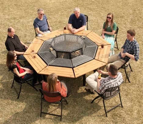 When you are not using the fire pit, you are able to put the cover on so that you can use it. BBQ Picnic Table Lets Everyone Cook | Designs & Ideas on ...