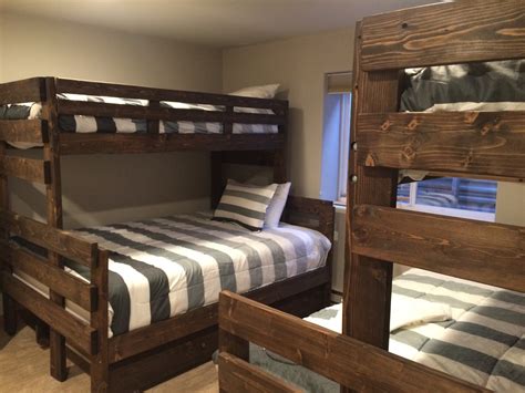 The queen bed underneath is sturdy enough for adults. Bunkbeds - MR. BUNKBED
