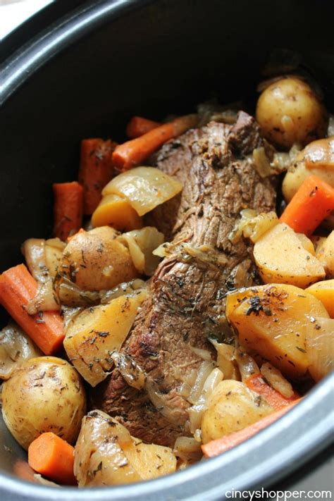 Pour in beef broth, then set the browned chuck roast on top. Slow Cooker Pot Roast - CincyShopper