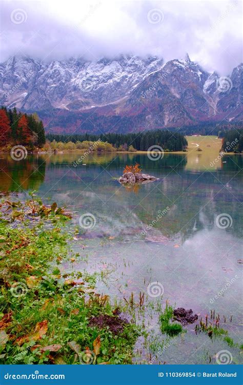 Beautiful Lago Di Fusine Mountain Lake In Autumn And Mangart Mountain