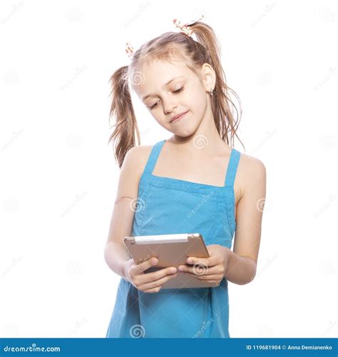 Young Seven Years Old Brunette Girl In Blue Dress On A White Iso Stock