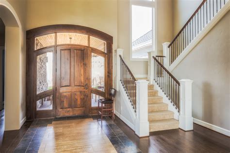 Example of a small transitional light wood floor and beige floor entryway design in minneapolis with gray walls and a black front door another chest with round mirror. 46 Beautiful Entrance Hall Designs and Ideas (Pictures)