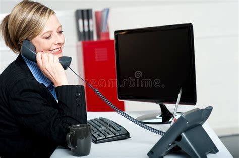 Female Secretary Answering Phone Call Stock Image Image Of Looking
