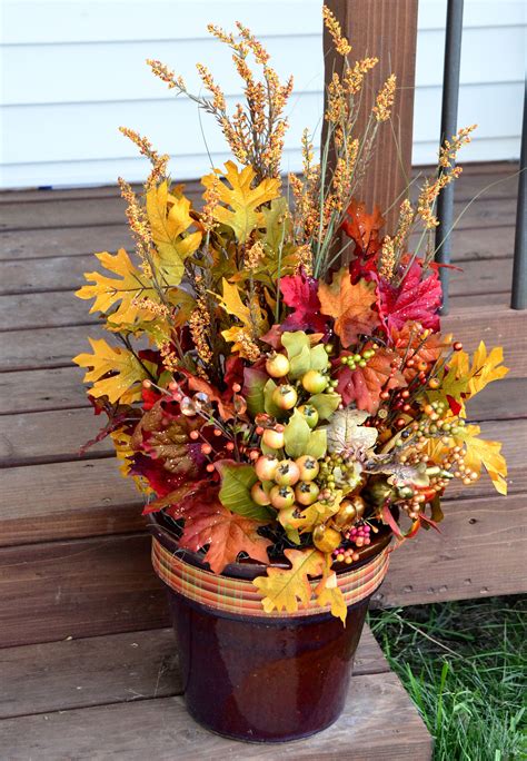 Fake outdoor flowers in pots. DIY Front porch curb appeal foliage: reuse pots from ...