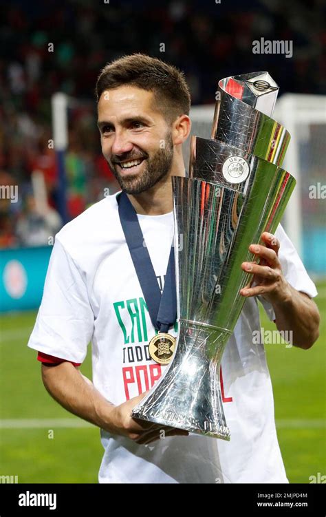 Portugals Joao Moutinho Poses With The Trophy At The End Of The Uefa