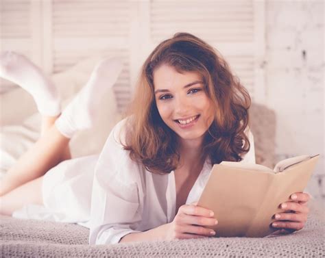 Premium Photo Lifestyle And People Conceptyoung Woman Lying In Bed While Read