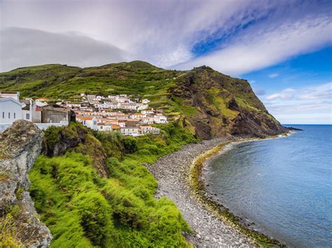 Roughly measured they lie about halfway between these . Travel Guide to the Azores Islands