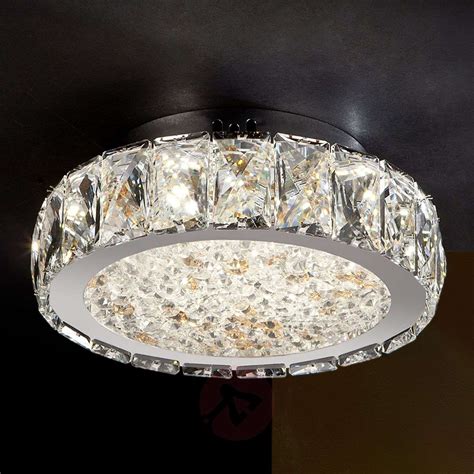 It is easy to install, guarantees quality and can be used to serve different functions. Dana - LED ceiling light with glass crystals | Lights.co.uk
