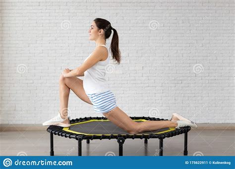 Relaxed Woman Jumping On Trampoline Stock Image Image Of Jumping