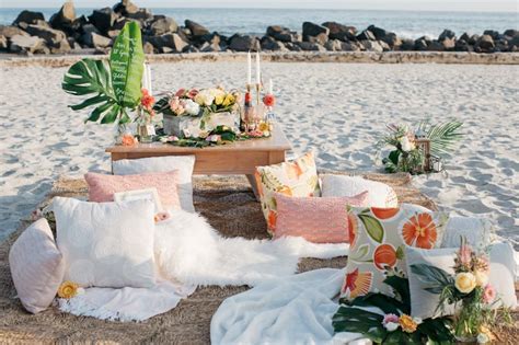 tropical beach picnic engagement