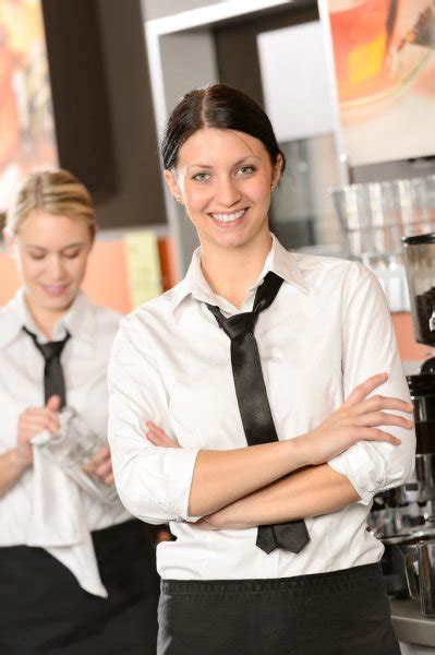 Waitress Posing With Plate In Restaurant Stock Photo By ©ikonoklast