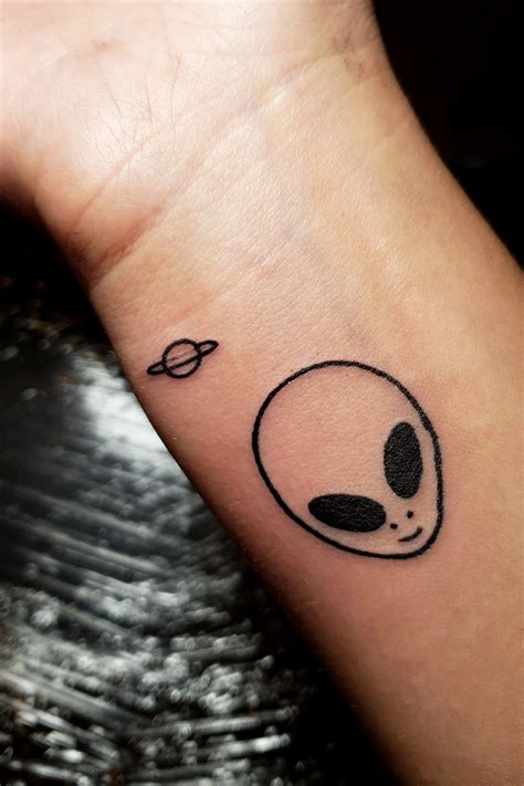 Small Alien Tattoo Top 13 Tattoo Designs And Their Meanings Trisped