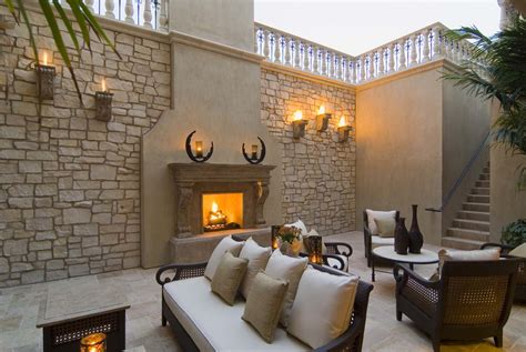 The Outdoor Fireplace Trend Heats Up Realm Of Design Inc