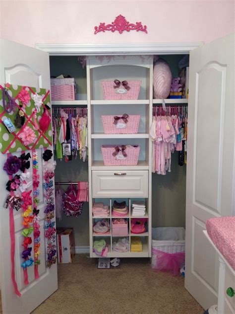 The first thing you see in the morning when you wake. Ultimate little girl closet - i adore the hairbow ...
