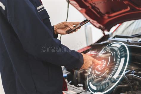 Asian Man Mechanic Inspection Shine A Torch Car Engine Checking Bug In