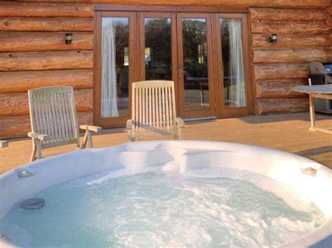 Roe Deer Riverside Log Cabin In Cumbria With Private Hot Tub