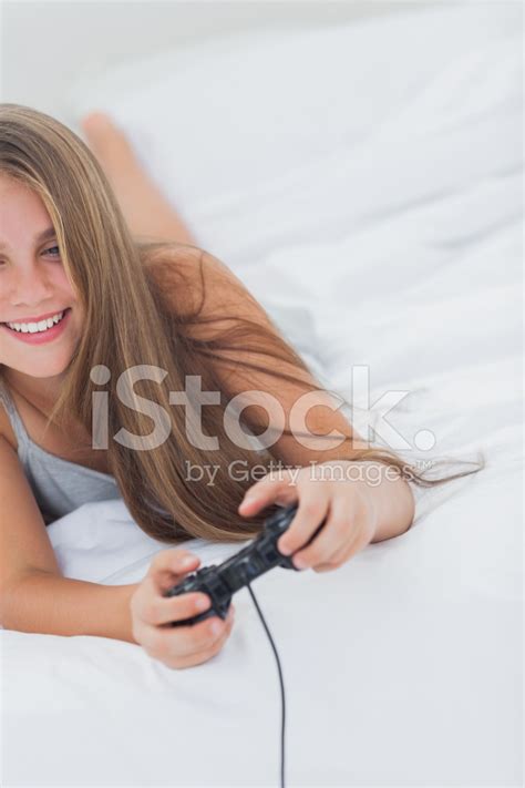 Cheerful Young Girl Playing Video Games Stock Photo Royalty Free