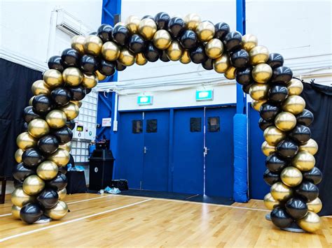 Black And Gold Chrome Balloon Arch That Balloons