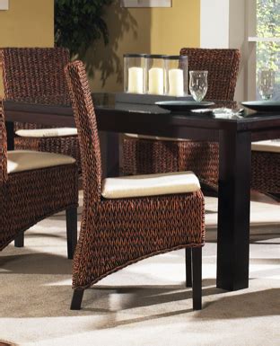 The natural seagrass material is stretched across a solid teak wood frame, creating a comfortable but solid piece of furniture. Seagrass Armless Dining Chair by Wicker Paradise. | Dining ...