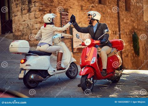 Young Couple On Vespa Scooter Bikers Couple Stock Image Image Of