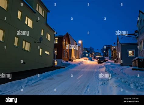 Snow Covered Residential Sroad In Tromso Stock Photo Alamy