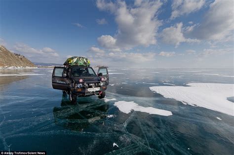 Stunning Photos On 500 Mile Drive Across Frozen Lake Baikal In Siberia