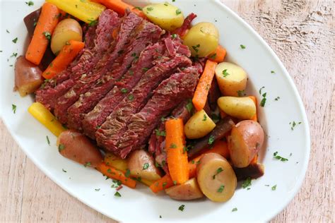 Thinly slice corned beef against the grain and serve with potatoes, carrots and cabbage, garnished with mustard and parsley, if desired. Instant Pot Corned Beef and Cabbage Recipe