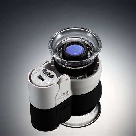 Turn on and off the lighting and do zoom in and out. Mini 45X Zoom Magnifying Glass Adjustable Loupe Magnifier ...