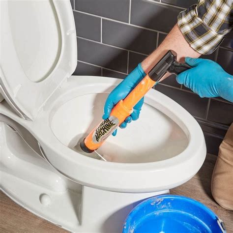 How To Unclog Your Toilet With Baking Soda How To Unclog A Toilet In
