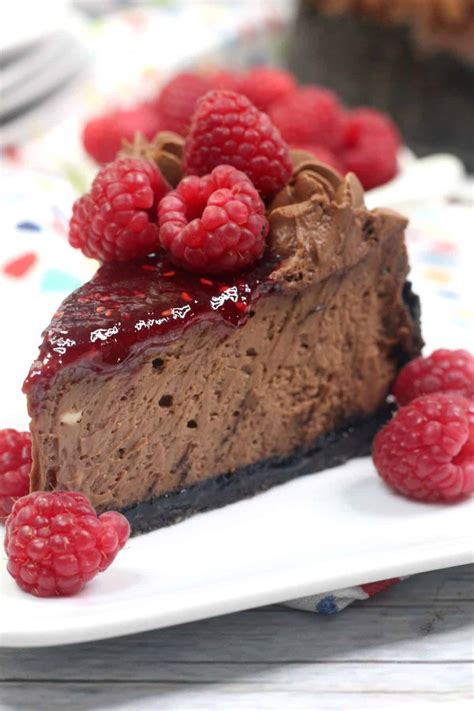 #ad i love my bird fruit feeder! Instant Pot Chocolate Raspberry Cheesecake Recipe - Sweet Pea's Kitchen