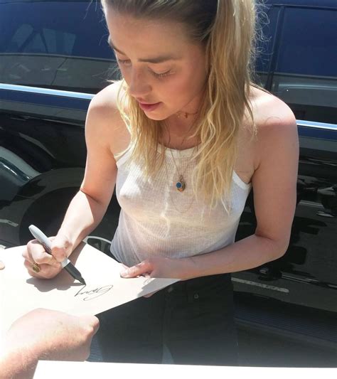 Amber Heard Braless 3 Photos Thefappening