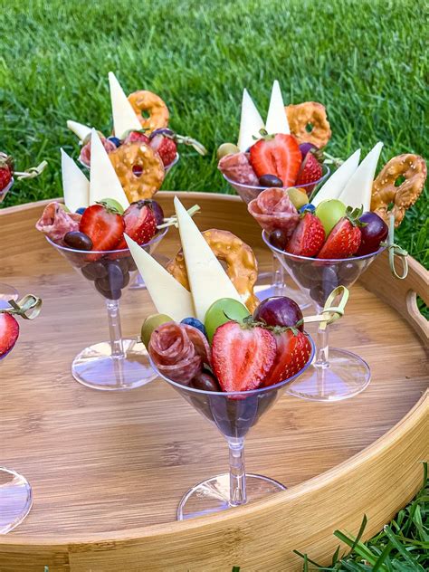 Charcuterie And Cheese Cups Served In Martini Glassesavailable For