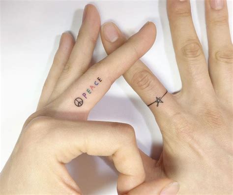 40 tiny finger tattoos that define perfection tiny finger tattoos finger tattoos tattoos