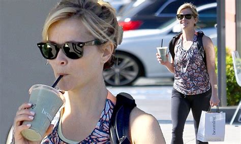 reese witherspoon goes make up free as she slips into tight workout gear for the gym daily