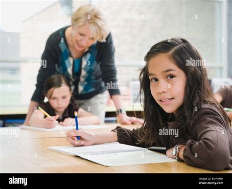 Indian Adult Woman Teacher Writing High Resolution Stock Photography