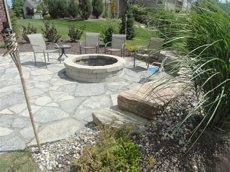 Our fire pits look great & last a lifetime. Fire pit and New York blue flagstone. | Fire pit ...