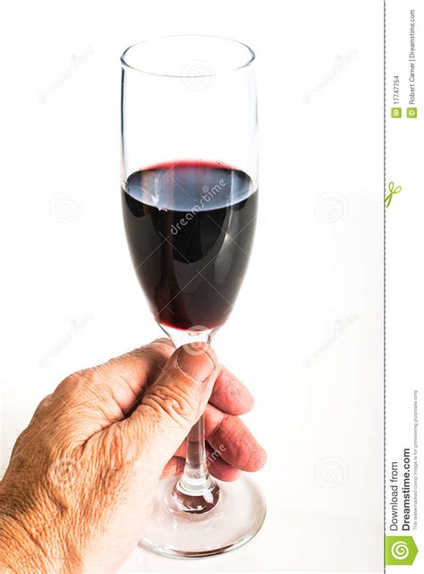 hand holding  glass  red wine stock images image