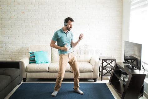 Attractive Man Dancing In The Living Room Stock Image Image Of Casual