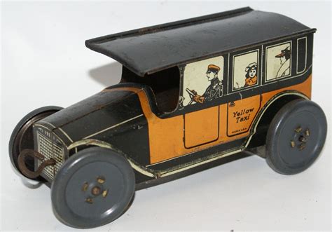 Rare Vintage Tin Lithographed Clockwork Wind Up Yellow Taxi Cab Mohawk