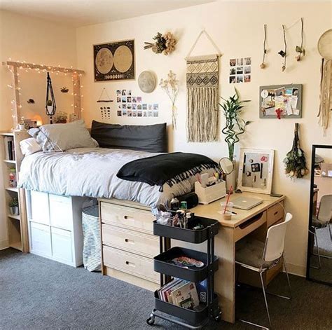 A Bedroom With A Bed Desk And Other Items On The Wall In It S Corner