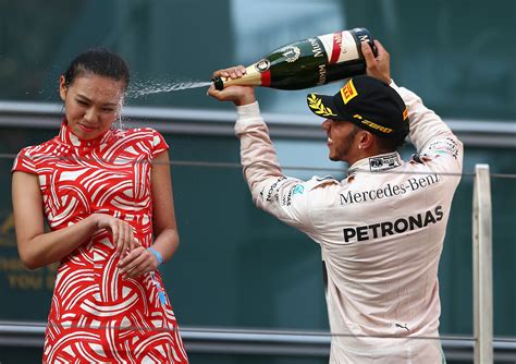 Formula 1 Champion Lewis Hamilton Under Fire For Spraying Podium Girl