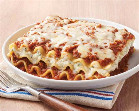Our Lasagna Features Freshly Made Pasta Layered Between A Sweet Tomato