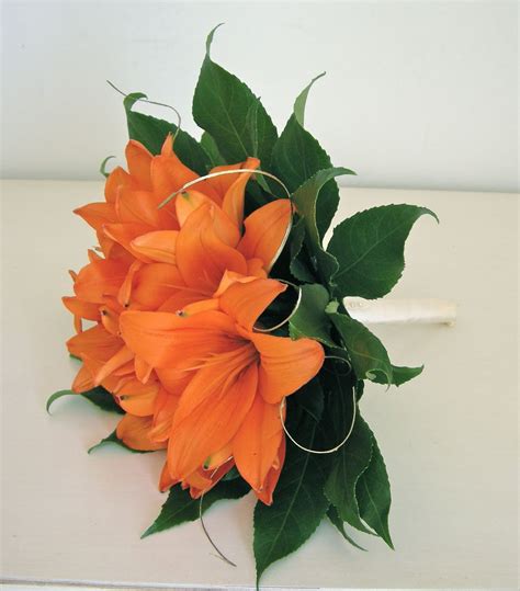 Roses, lilies and arum lilies, gerberas and many other orange flowers look amazing in different combinations. Wedding Flowers Blog: Beth's Contemporary Wedding Flowers ...